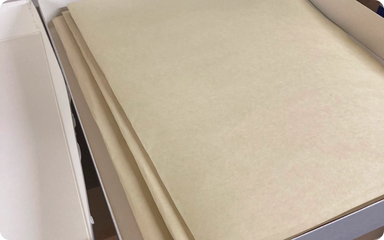 Acid-free tissue protects Campbell Press newspapers before digitization at Campbell Museum