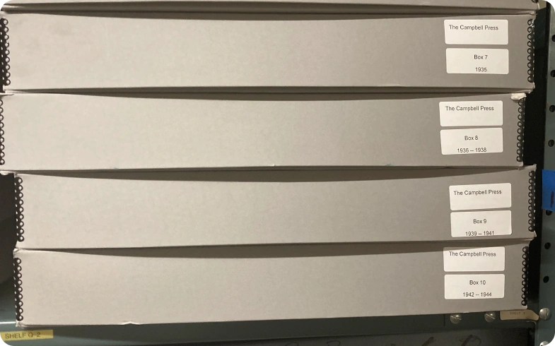 Campbell Press archival storage boxes organized by year for newspaper digitization