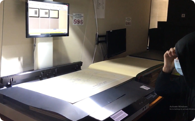 Digitizing fragile Campbell Press newspapers using flatbed archival scanner